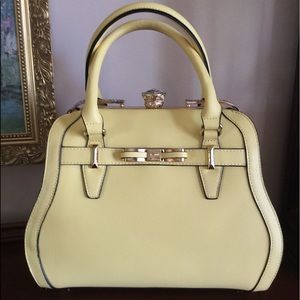 Cute yellow bag with rhinestone clasp!